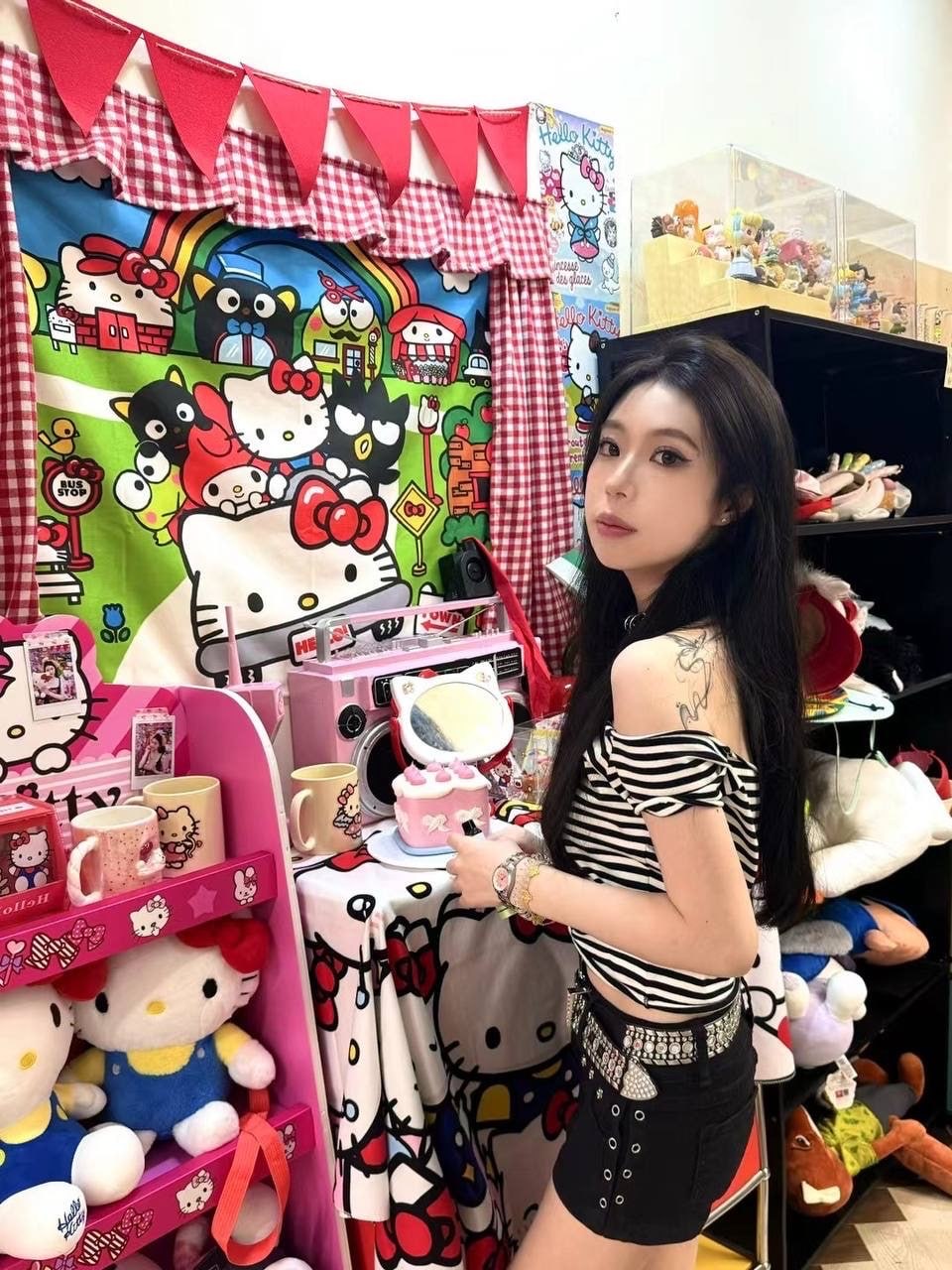 A woman with an internet-famous appearance during the day, wearing black silk